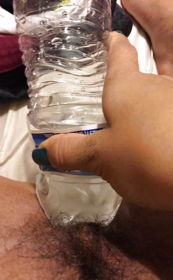 Water Bottle in my tight hairy teen pussy  (1/4)