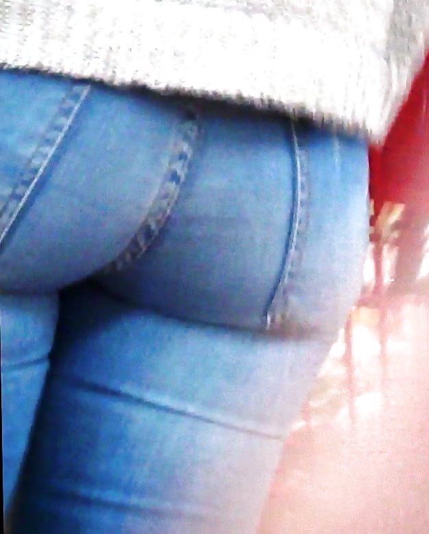 Her ass in jeans showing off her round butt (14/70)
