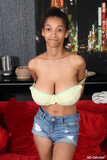 Amateur_ebony_Addisson_lets_out_her_monster_boobs_and_eats_a_banana (7/20)