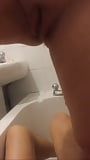 Pissing on my cock in the bath (12)