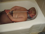 Fat_nasty_slut_tied_in_the_bath_tub_and_pissed_on (17/17)