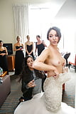 Bride_and_Bridesmaids_Getting_Ready_For_Wedding (1/10)