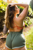 Thick female Paige Turnah exposes her tits in the backyard wearing shorts (16)