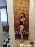 Short_brunette_takes_selfies_while_stripping_ _posing_sexily_in_the_mirror (5/20)