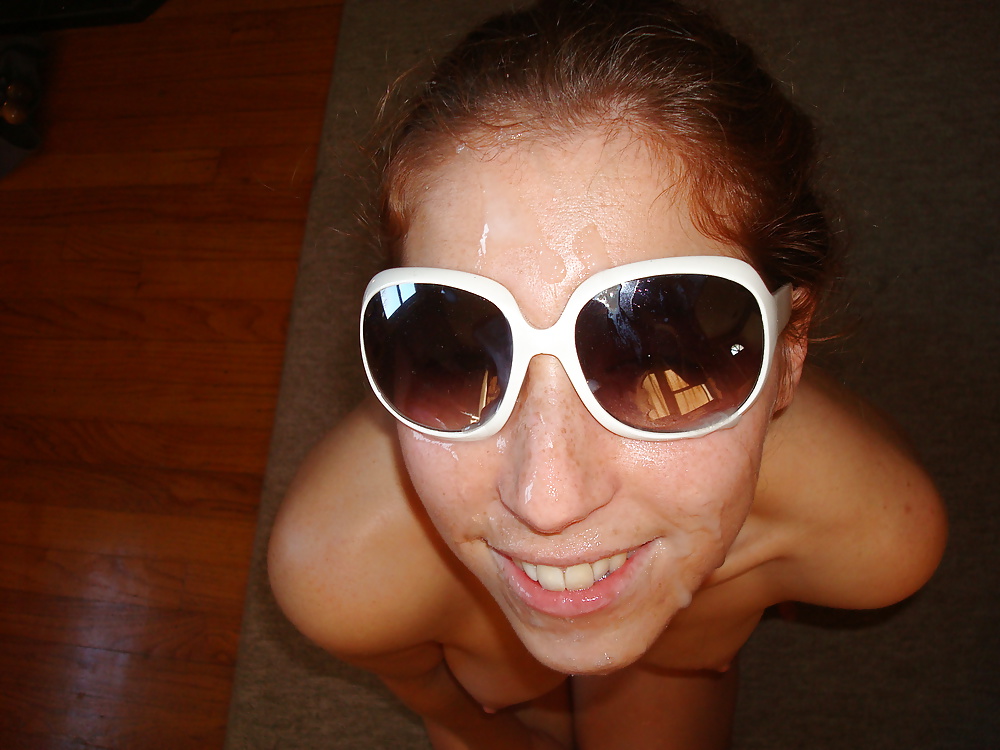 huge facial for young redhead in sunglasses  (2/2)