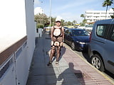 a grown woman in a revealing dress on the street (6)