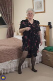 BBW_granny_with_glasses_Caroline_V_strips_to_her_lingerie_ _masturbates (14/21)