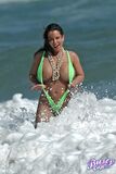 Amply endowed female Alicia Dimarco struts in a v-bikini amid foamy surf (15)