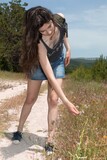 Petite_teen_Dennis_shows_off_her_small_tits_and_natural_hairy_slit_outdoors  (1/21)