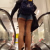 Candid voyeur teen booty on escalator popping out of shorts (8)