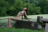 Nudist girl at the pond. (7/7)