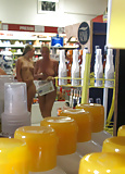 Sensational women nude in shop (2)