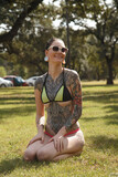Inked girlfriend Kelly Lamprin exposes her tiny tits and ass in the park (11)