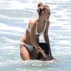 Miley_Cyrus_wears_a_white_bikini_on_the_beach (2/17)