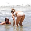 Miley_Cyrus__wears_a_white_bikini_on_the_beach (7/17)