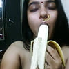 Indian_amateur_playing_with_banana (17/30)