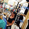 Candid_voyeur_gym_shorts_and_big_tits_in_surf_store (17/21)