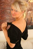 Blonde babe Sam K doffs her black dress and flaunts her adorable bosom (11/21)