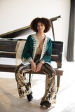 Ebony_centerfold_model_Stormi_Maya_gets_naked_in_boots_on_a_piano_bench (2/12)