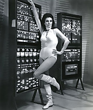 Vintage_women_tuning_in_to_television_or_radio_ (13/15)