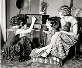 Vintage_women_tuning_in_to_television_or_radio_ (2/15)